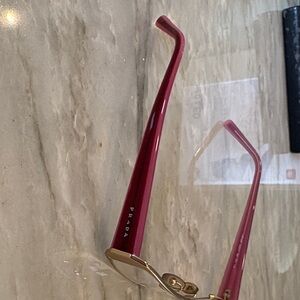 Prada Women's gold and pink glasses